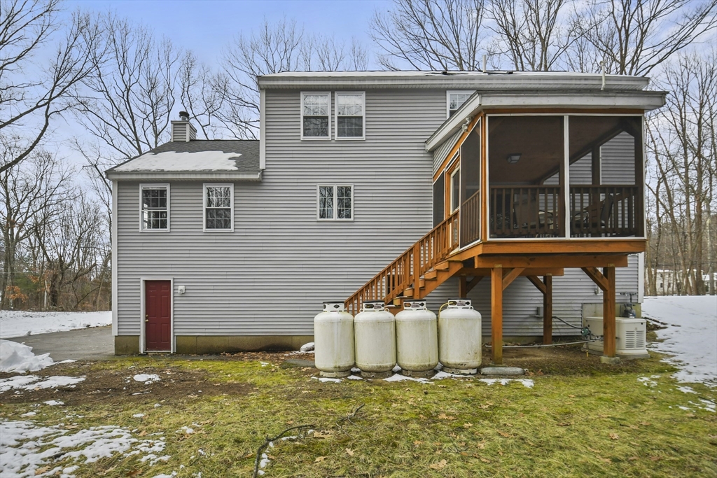 47 Scribner Road Tyngsboro, MA 01879 - Photo 31 of 38 a house view with a garden space