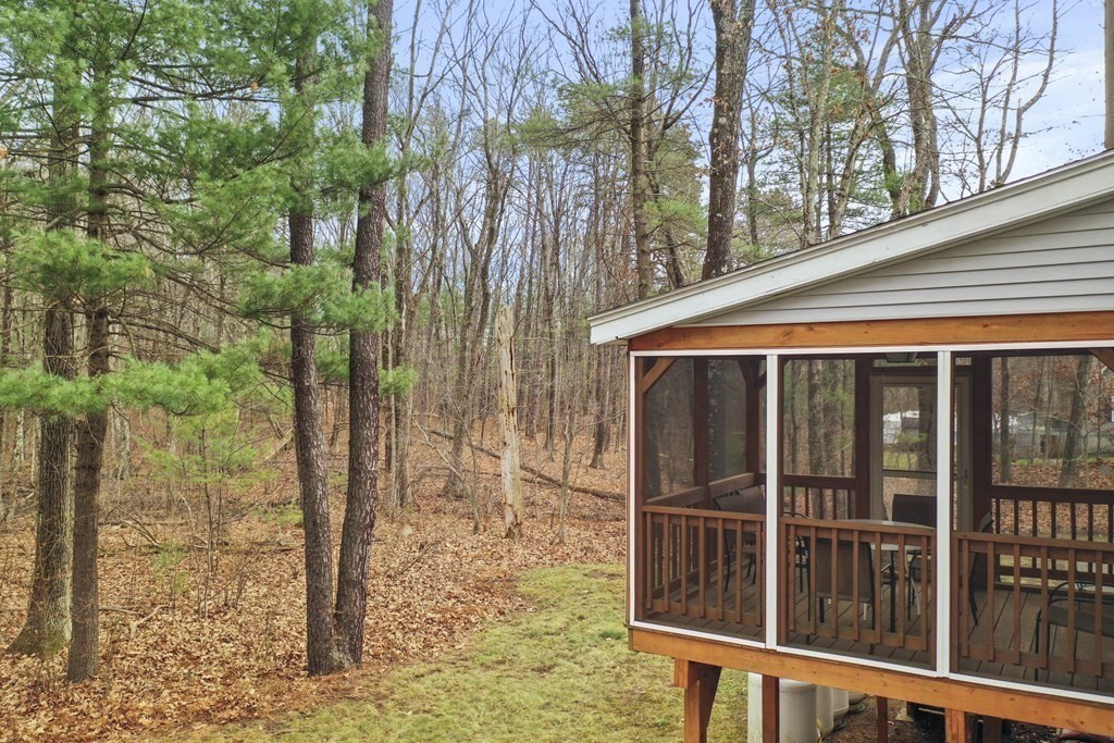 47 Scribner Road Tyngsboro, MA 01879 - Photo 34 of 38 a view of a porch with a backyard