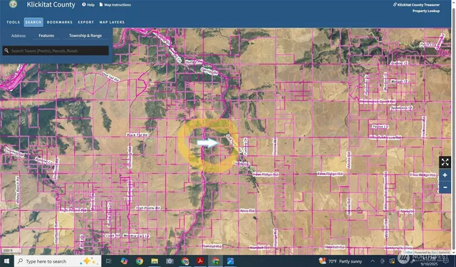 a view of a floor to ceiling window and a yard