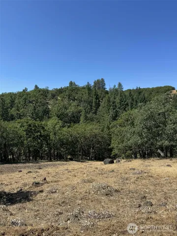 a picture of a bathroom with a shower