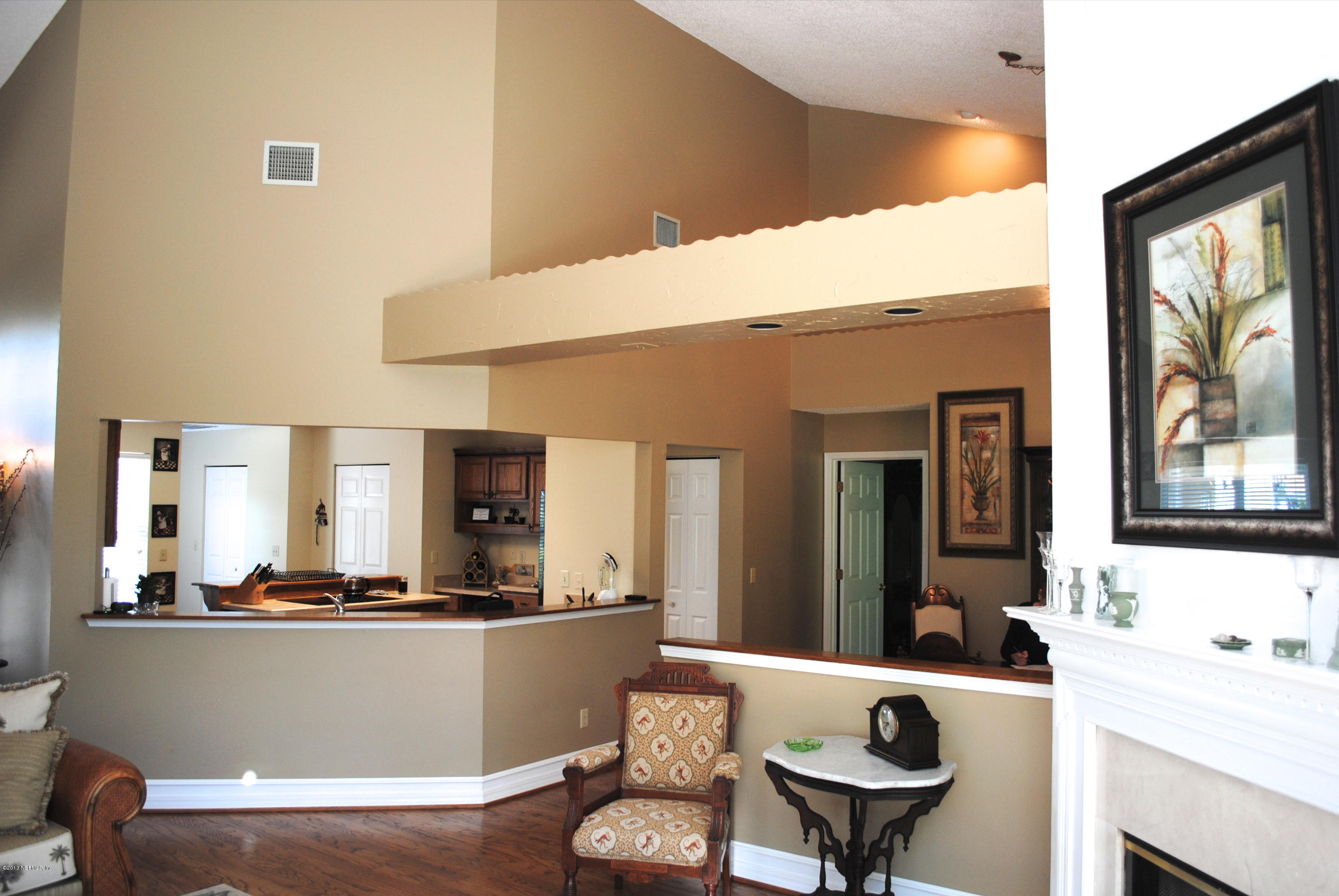 1473 Marsh Rabbit Way Fleming Island, FL 32003 - Photo 8 of 35 Great Room to Kitchen View