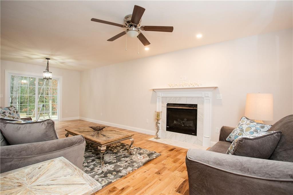 7 Great Pasture Road Cape Neddick, ME 03902 - Photo 4 of 34 A gas fireplace provides warmth and...