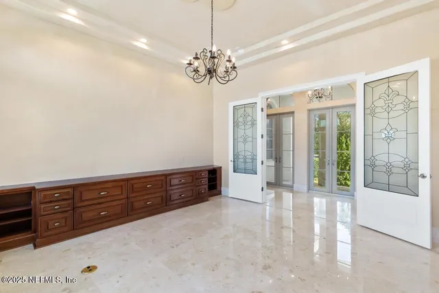 a kitchen with granite countertop lots of counter top space and stainless steel appliances