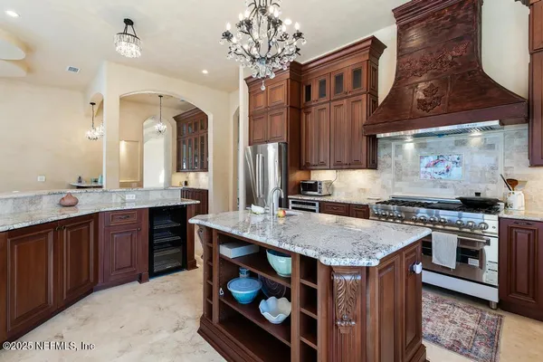 a view of a swimming pool with an outdoor space and seating area