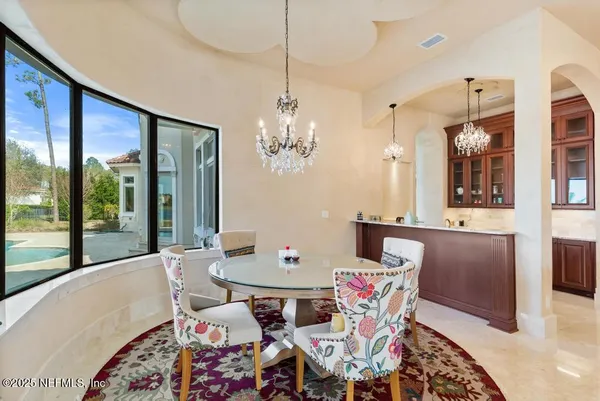 a front view of a house with swimming pool