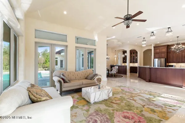 a kitchen with a sink a counter top space and a fireplace