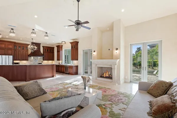 an aerial view of residential house with outdoor space and parking