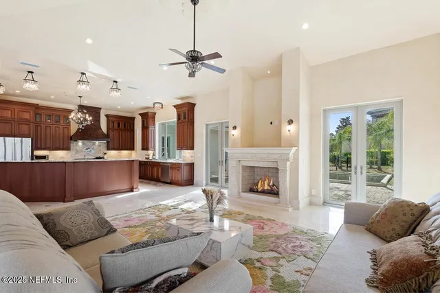 an aerial view of residential house with outdoor space and parking