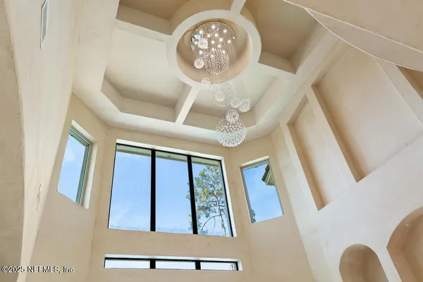 a bedroom with a bed and a fireplace