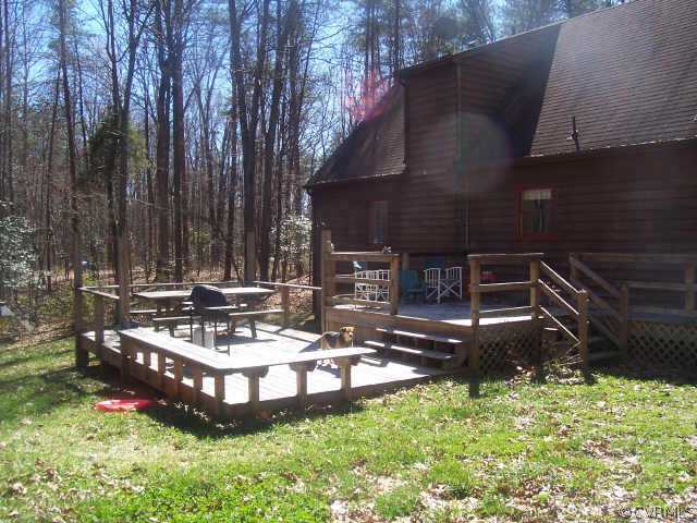 1900 Hawk Town Road Maidens, VA 23102 - Photo 4 of 7 a view of a couches in backyard of house