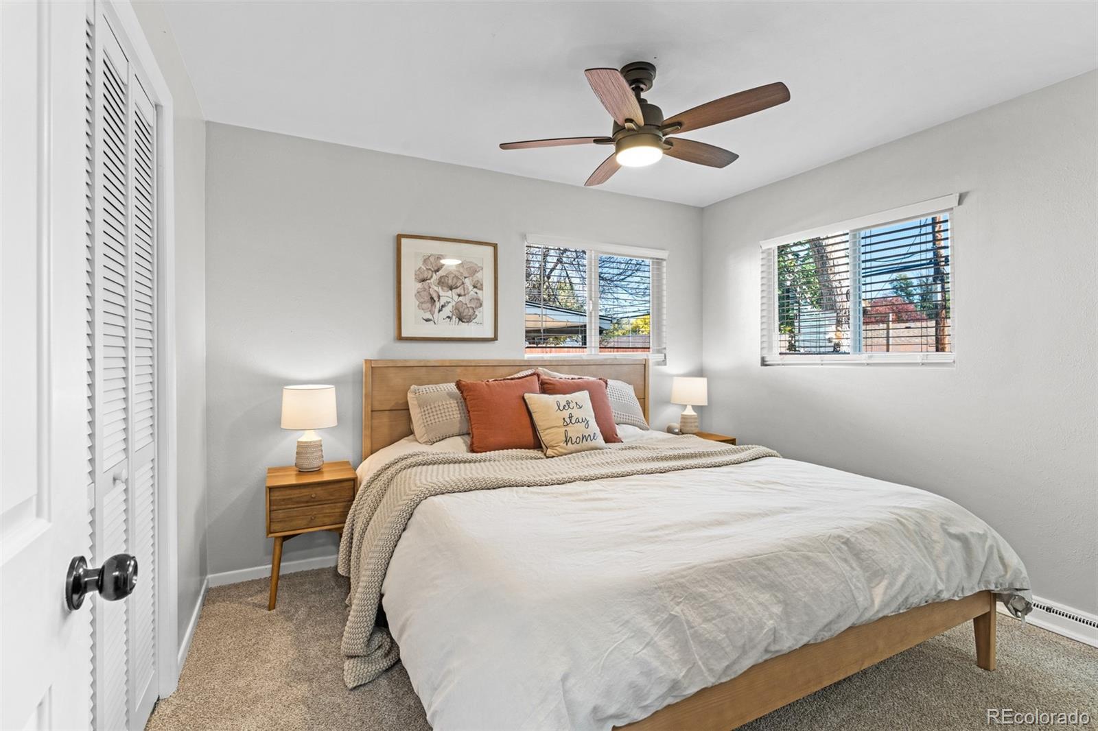 6000 Garrison Street Arvada, CO 80004 - Photo 17 of 50 a bedroom with a bed and window