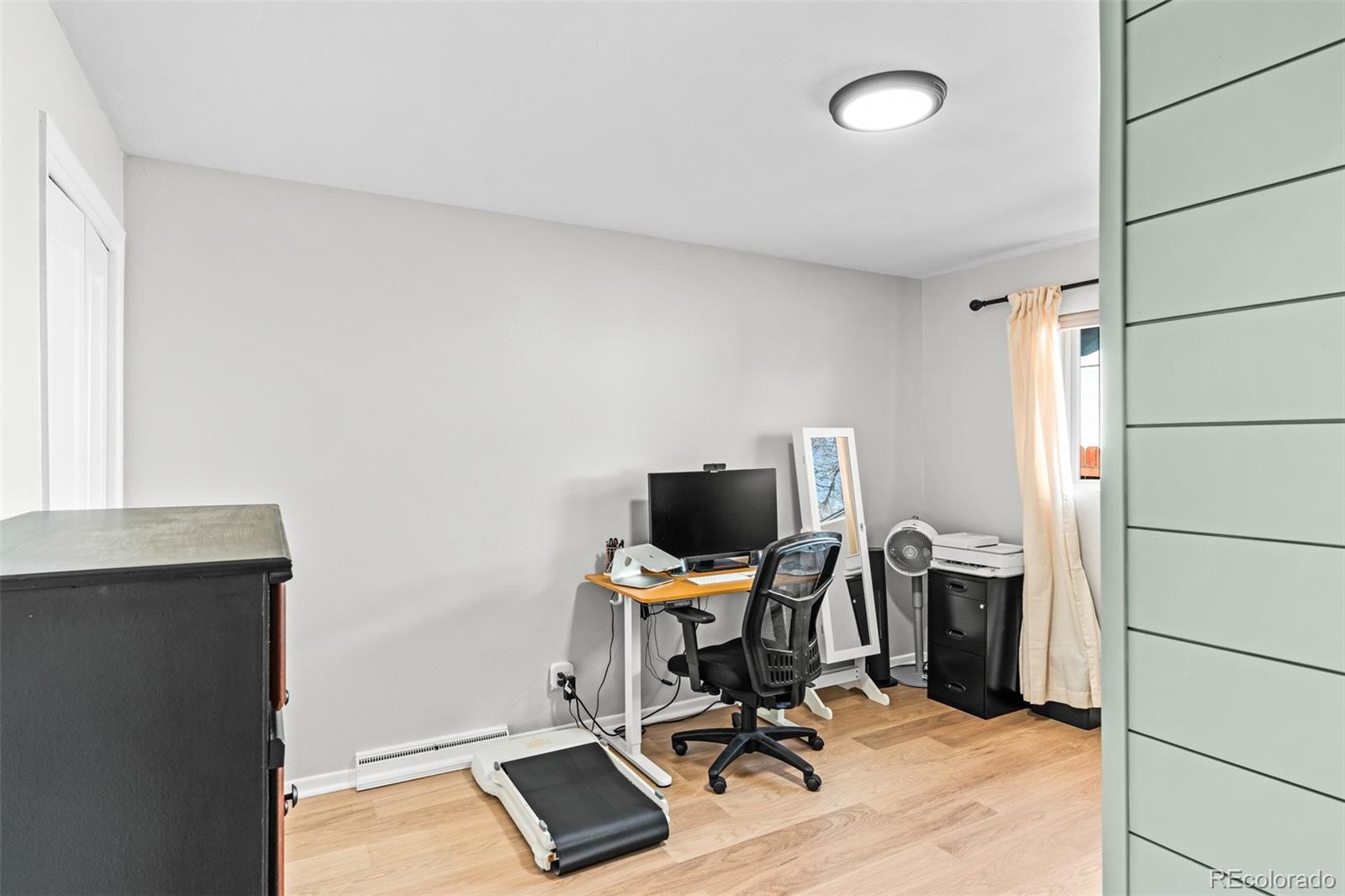 6000 Garrison Street Arvada, CO 80004 - Photo 20 of 50 a view of workspace with wooden floor windows