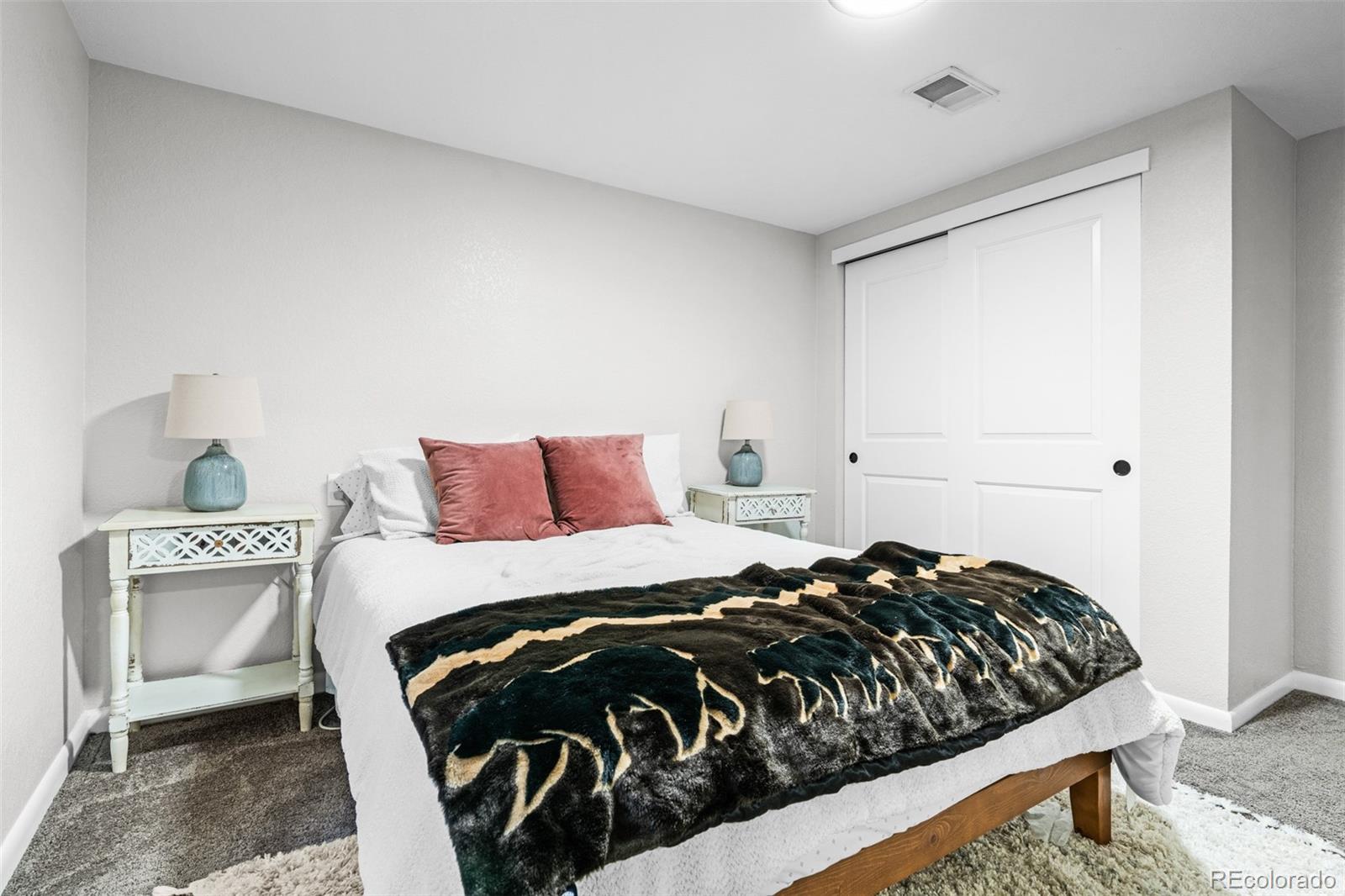 6000 Garrison Street Arvada, CO 80004 - Photo 27 of 50 a bedroom with a bed and window