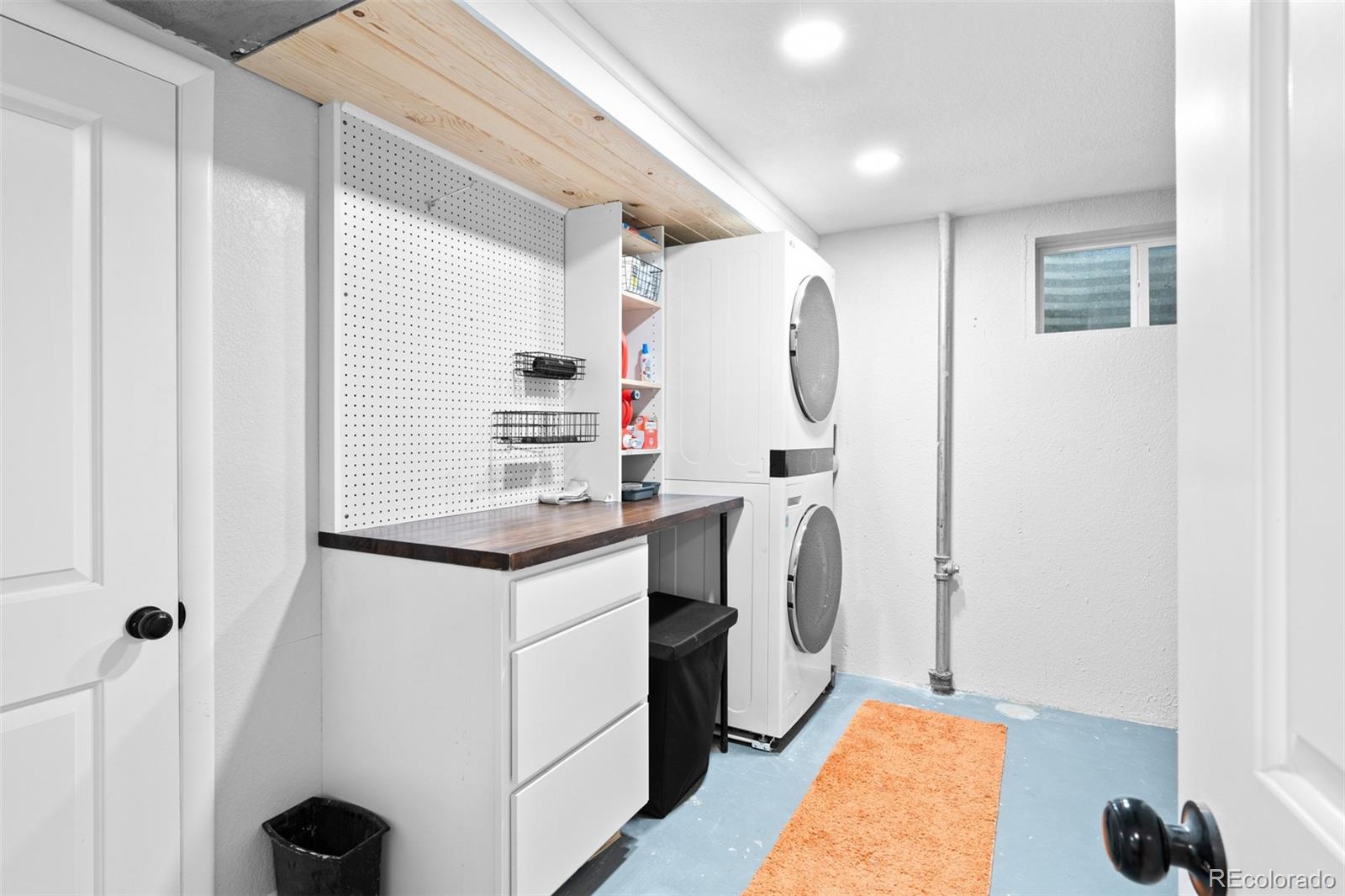 6000 Garrison Street Arvada, CO 80004 - Photo 30 of 50 a bathroom with a sink and a mirror