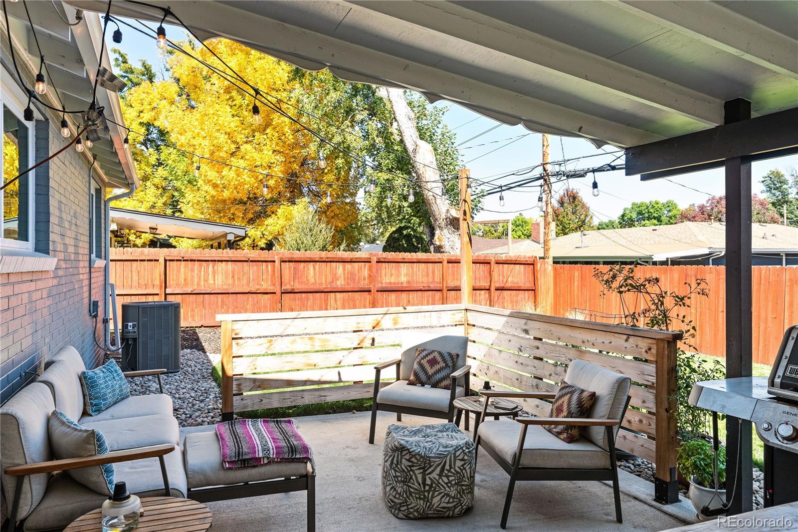6000 Garrison Street Arvada, CO 80004 - Photo 33 of 50 a view of a chairs and tables in the patio