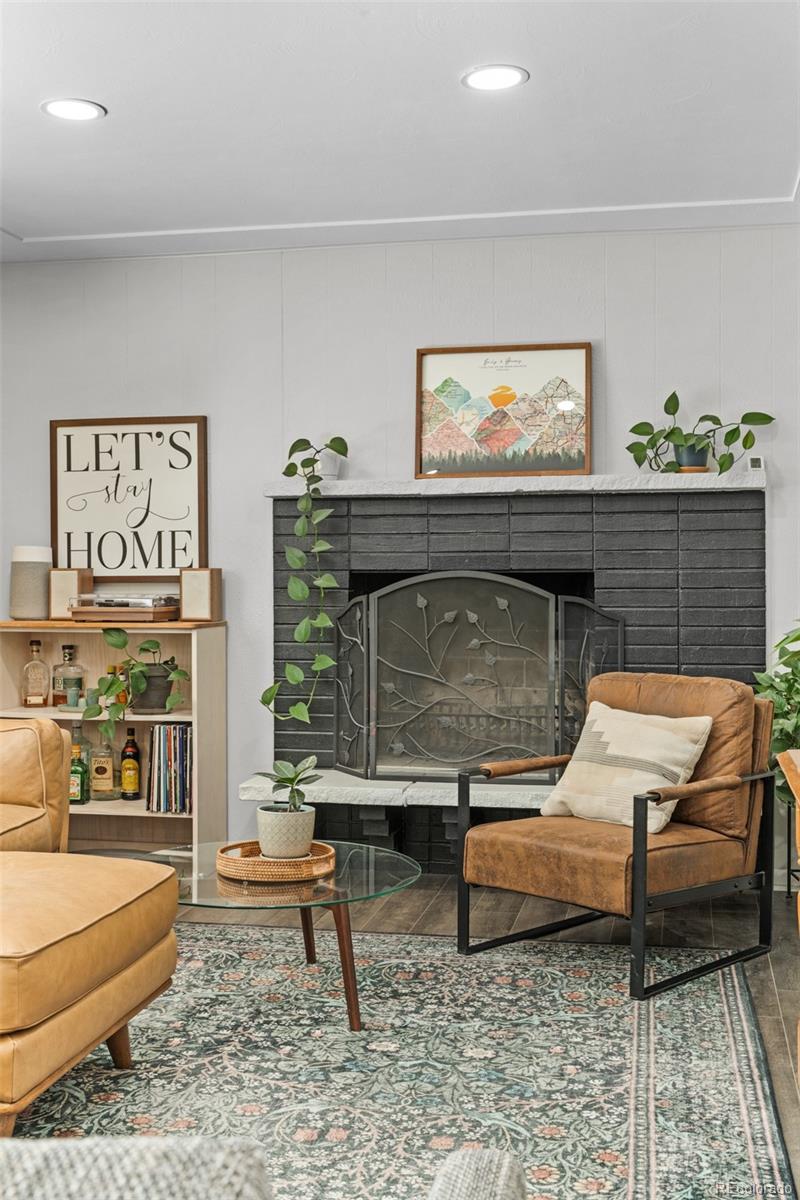 6000 Garrison Street Arvada, CO 80004 - Photo 8 of 50 a living room with furniture and a rug