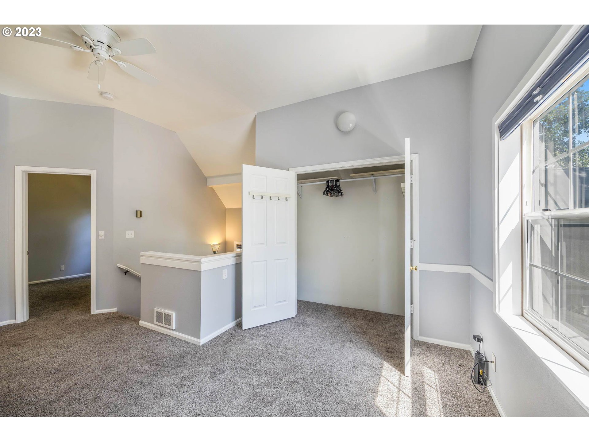 3595 Arbor Avenue Eugene, OR 97402 - Photo 19 of 26 a view of an empty room with window and kitchen view