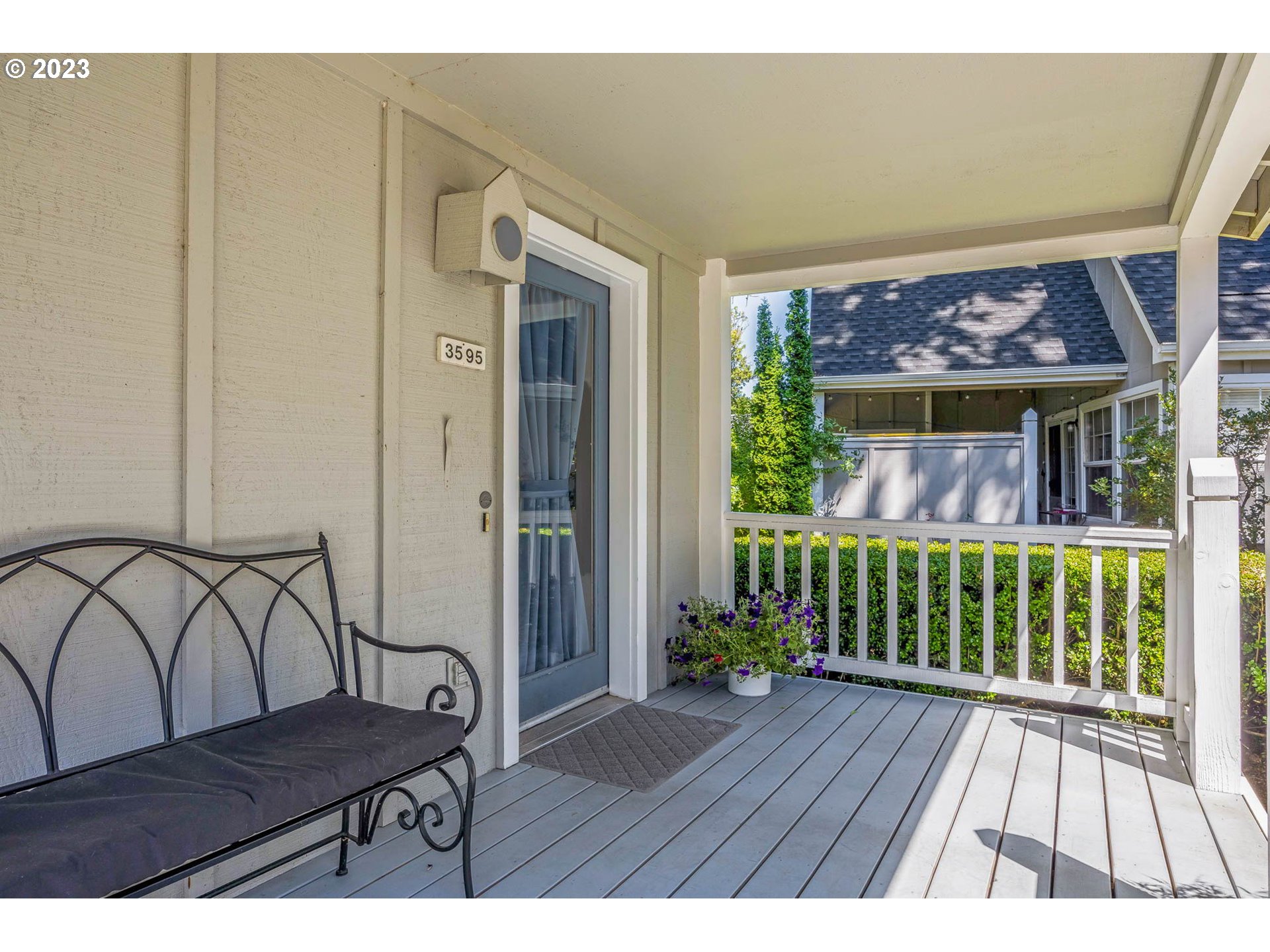 3595 Arbor Avenue Eugene, OR 97402 - Photo 6 of 26 a view of a porch with furniture and wooden floor