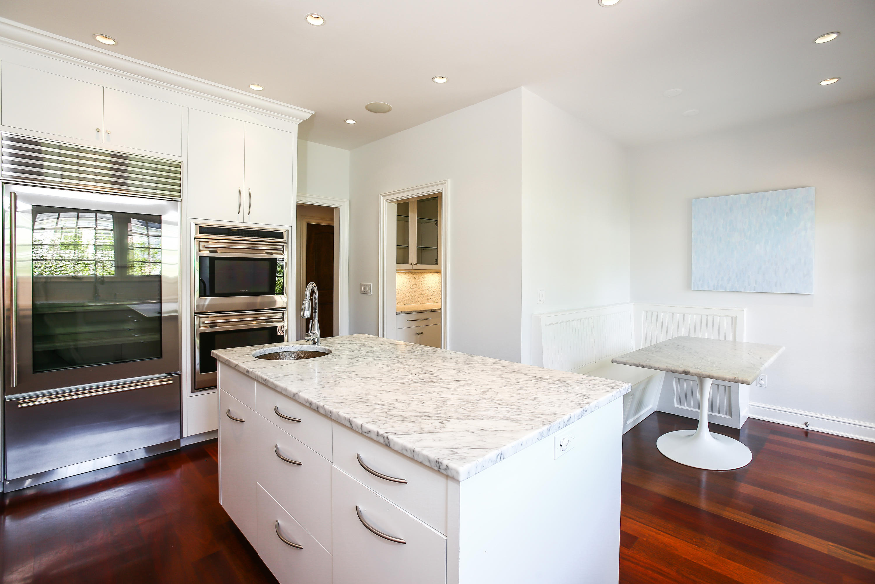 7 Sunwich Road Rowayton, CT 06853 - Photo 12 of 33 a kitchen with a sink and a refrigerator