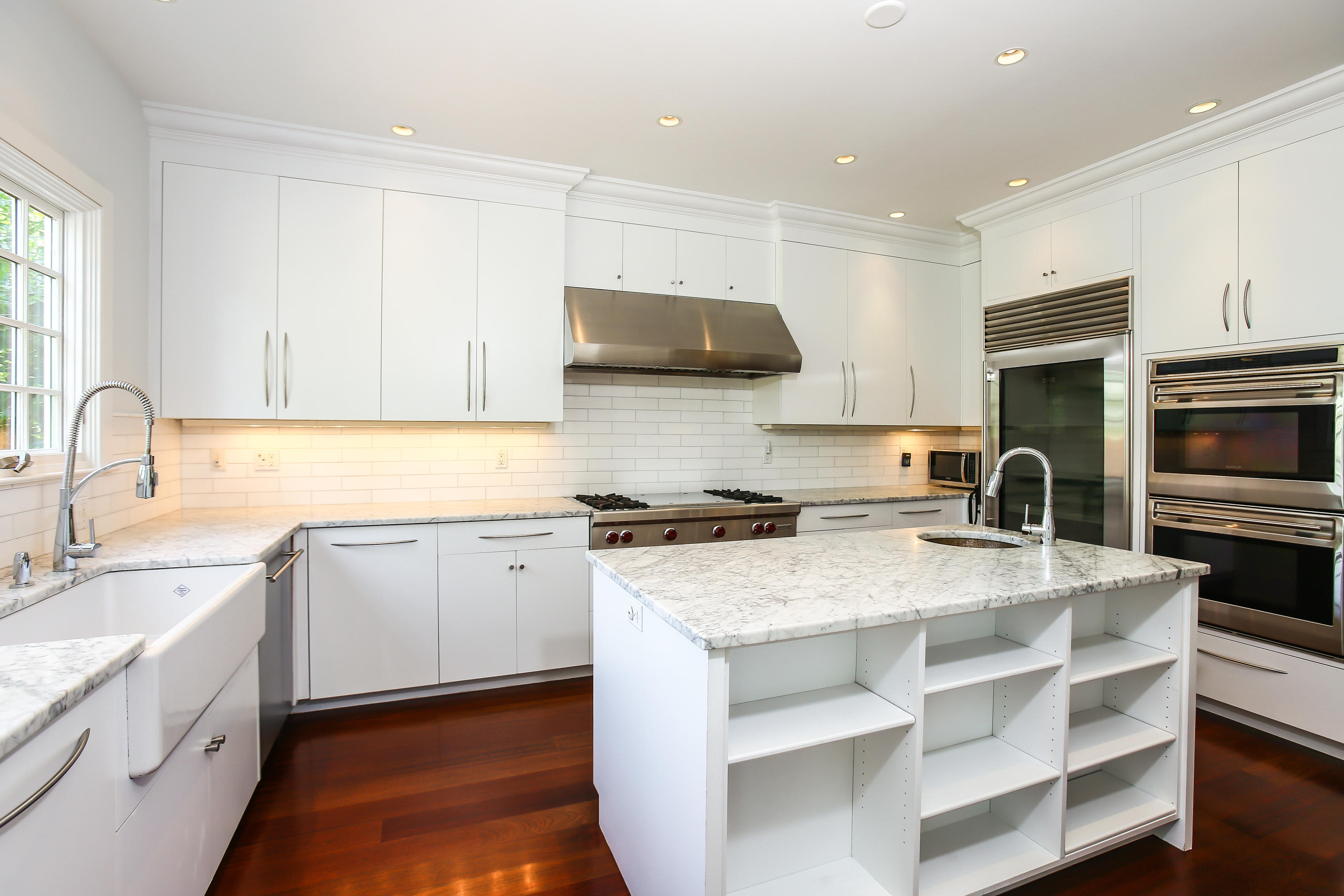7 Sunwich Road Rowayton, CT 06853 - Photo 13 of 33 a kitchen with a sink stove top oven and refrigerator