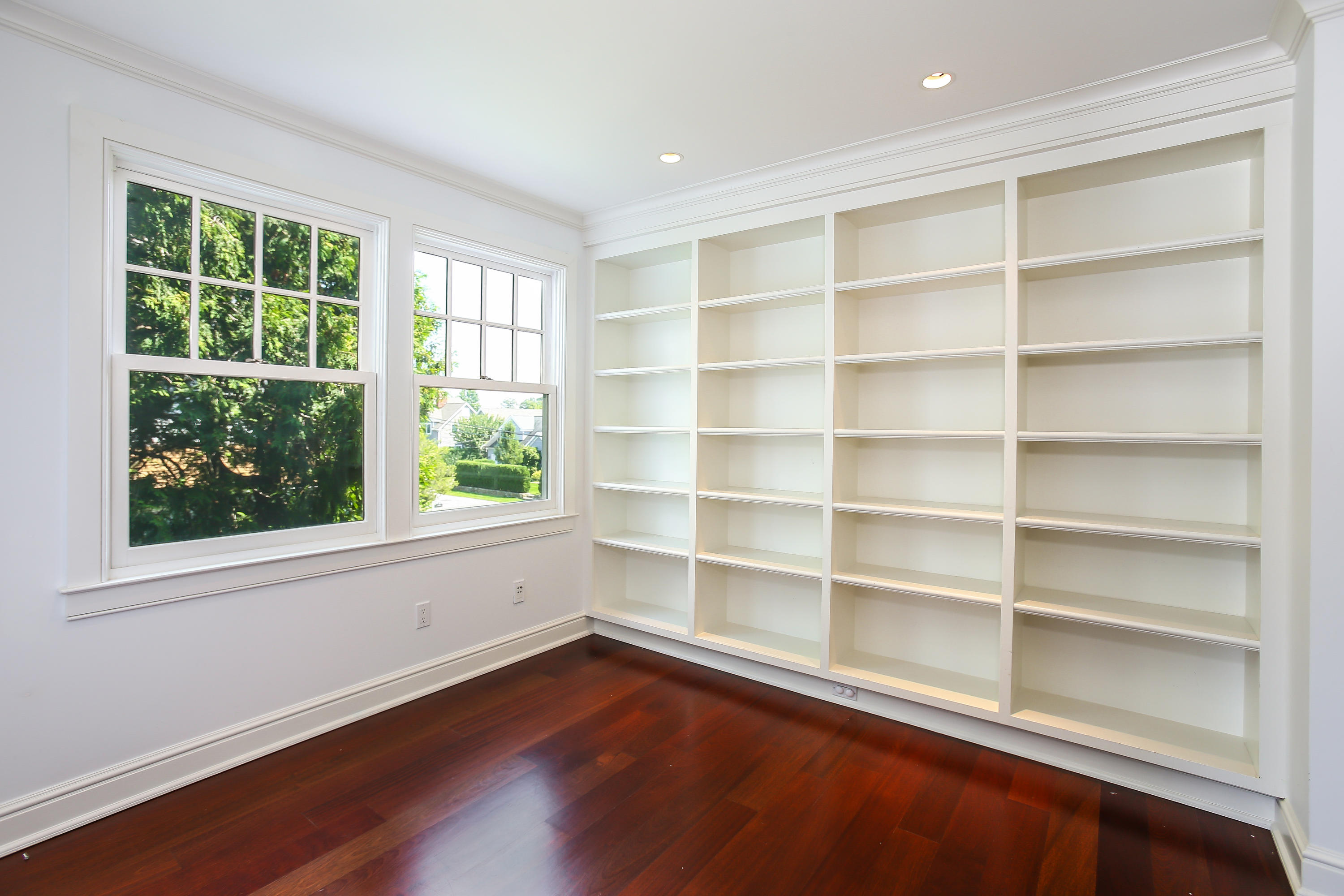 7 Sunwich Road Rowayton, CT 06853 - Photo 18 of 33 a view of a room with wooden floor and windows