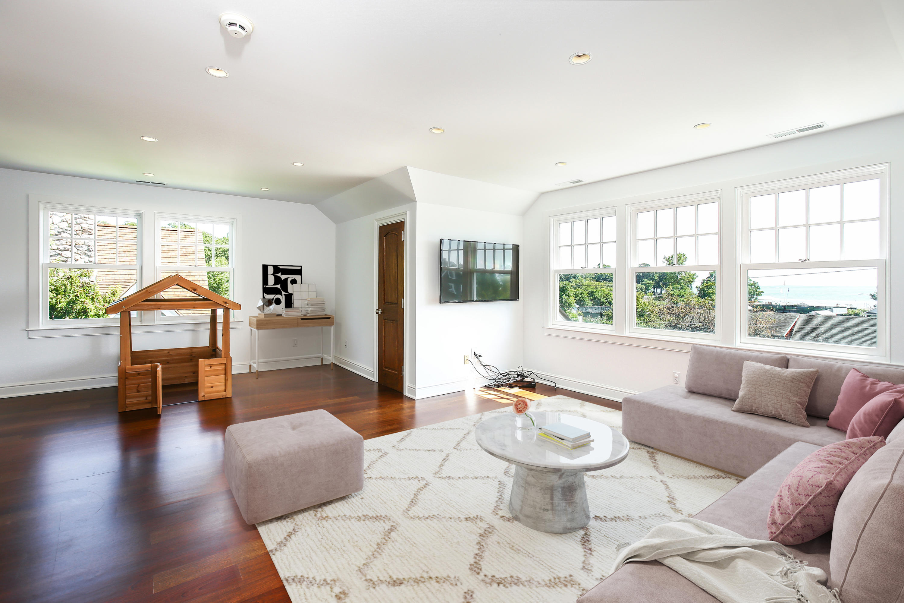 7 Sunwich Road Rowayton, CT 06853 - Photo 22 of 33 a living room with furniture and a large window