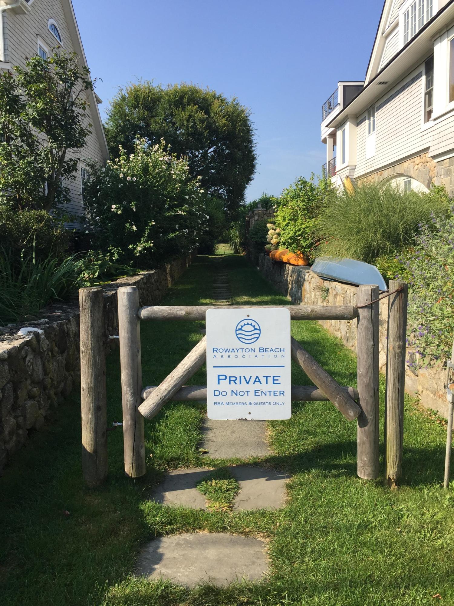 7 Sunwich Road Rowayton, CT 06853 - Photo 29 of 33 a view of a sign in front of a house with a yard