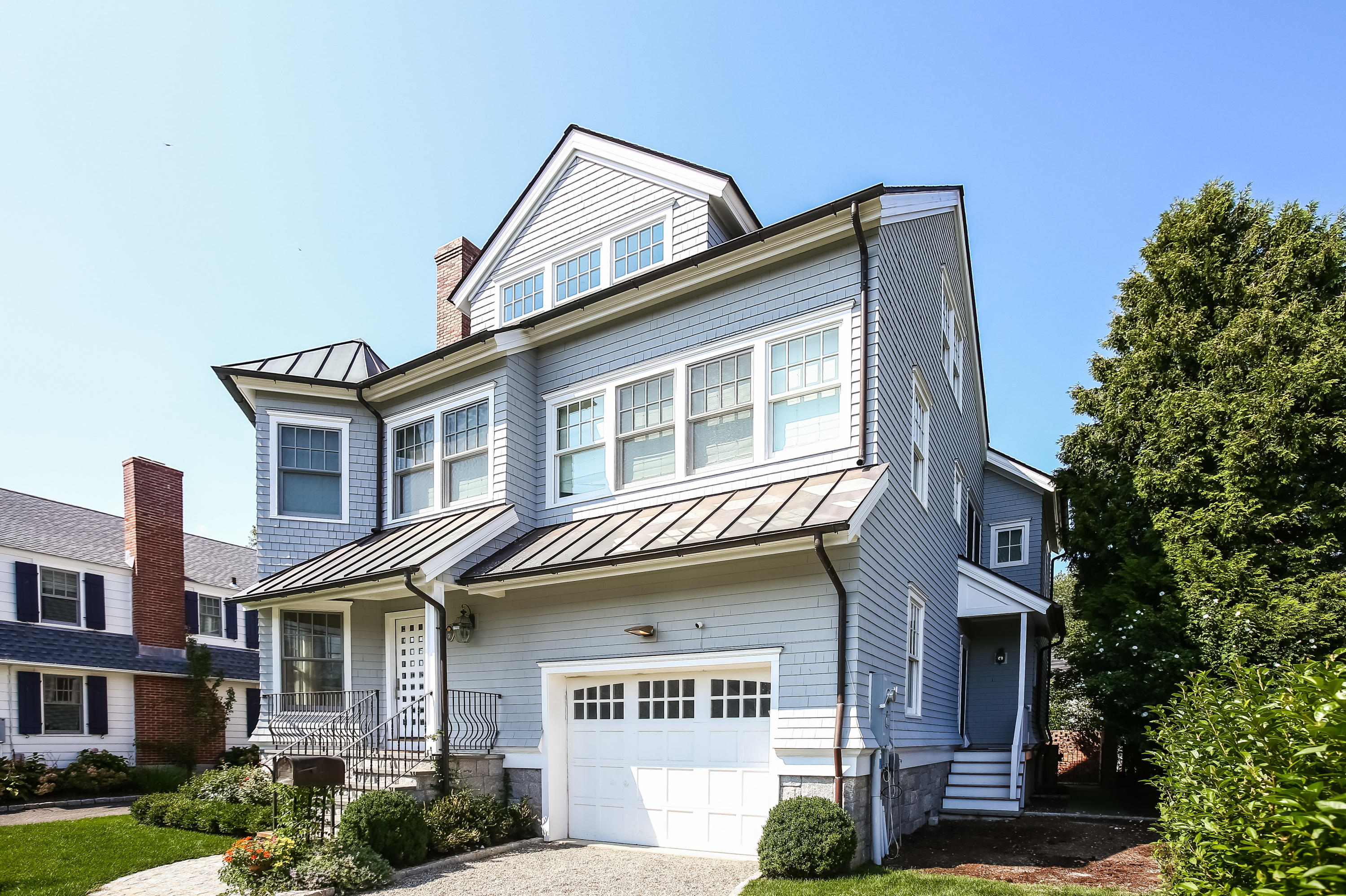 7 Sunwich Road Rowayton, CT 06853 - Photo 3 of 33 a front view of a house with garden