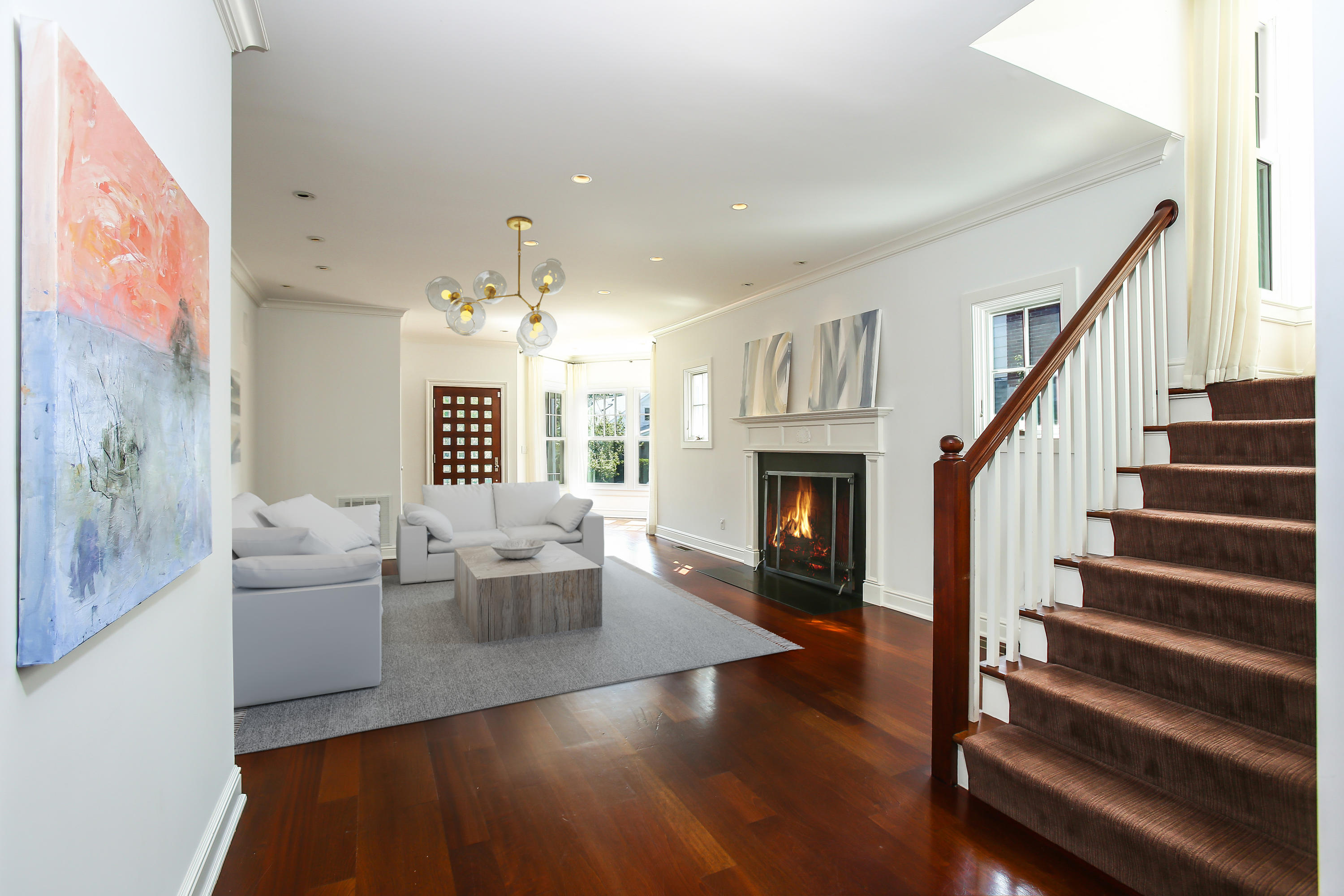 7 Sunwich Road Rowayton, CT 06853 - Photo 6 of 33 a living room with fireplace furniture and a wooden floor