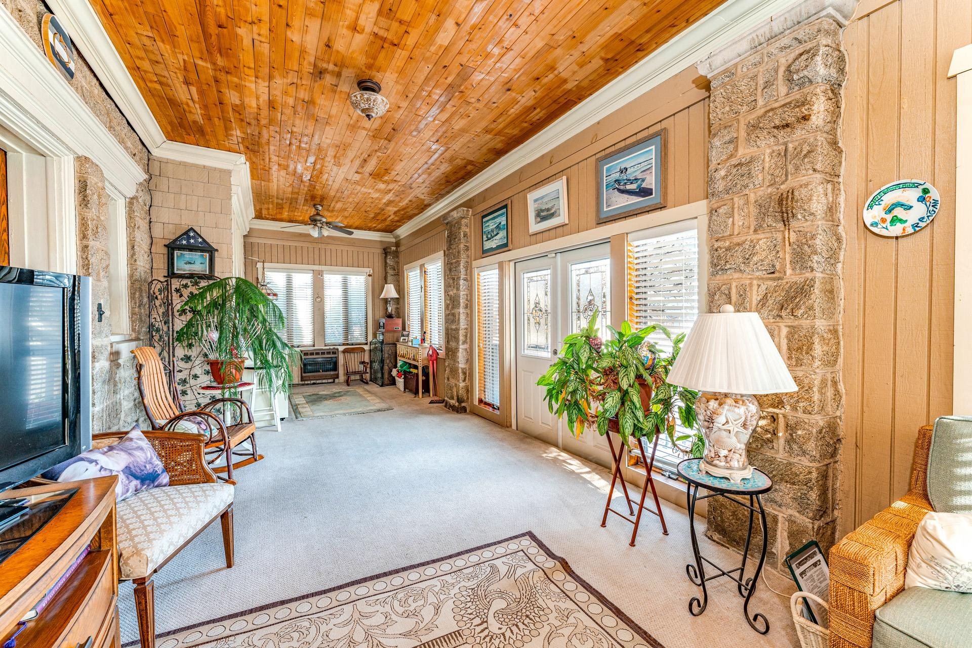 825 Bay Somers Point, NJ 08244 - Photo 11 of 41 a room with furniture and a chandelier