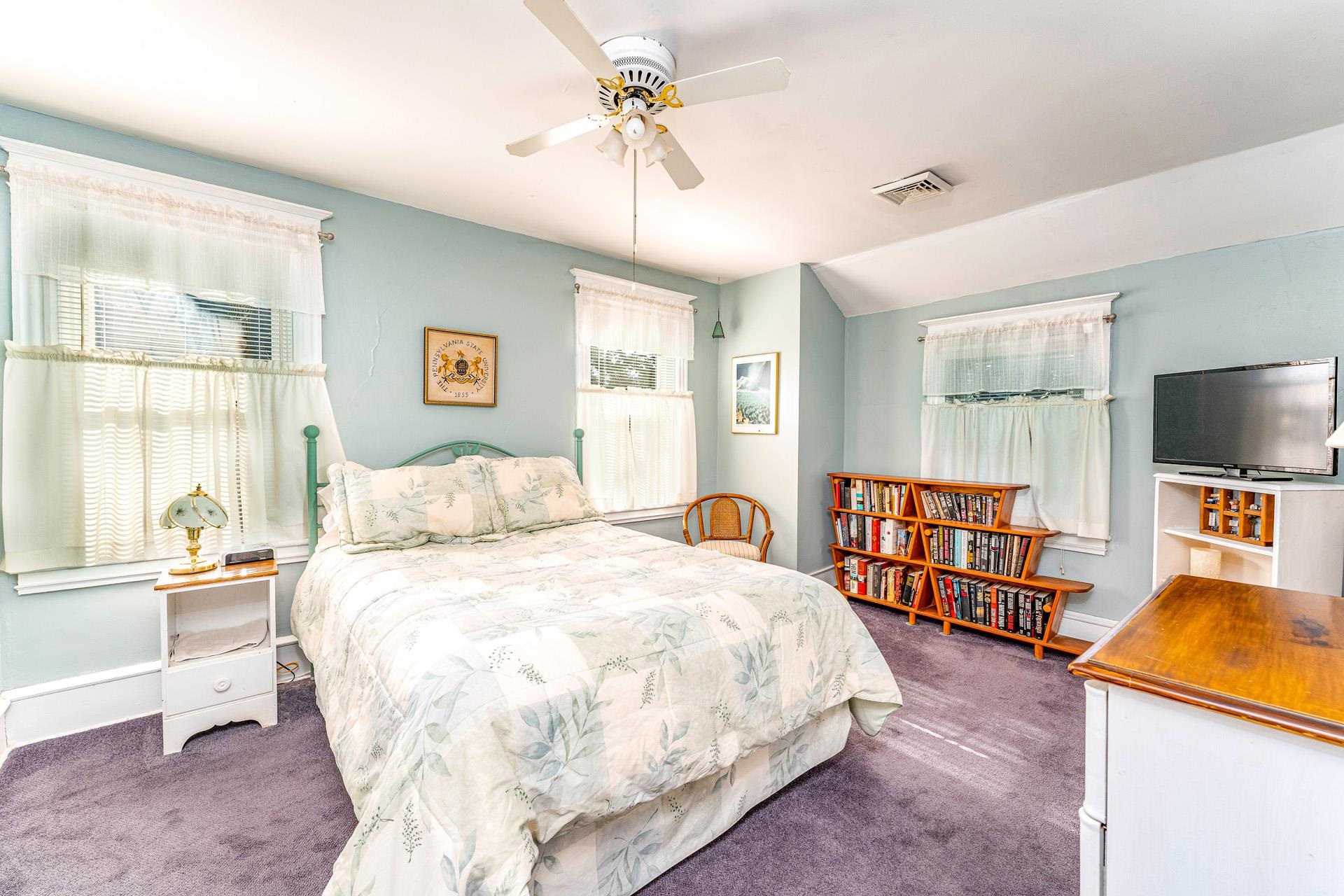 825 Bay Somers Point, NJ 08244 - Photo 17 of 41 a bedroom with a bed and a flat screen tv
