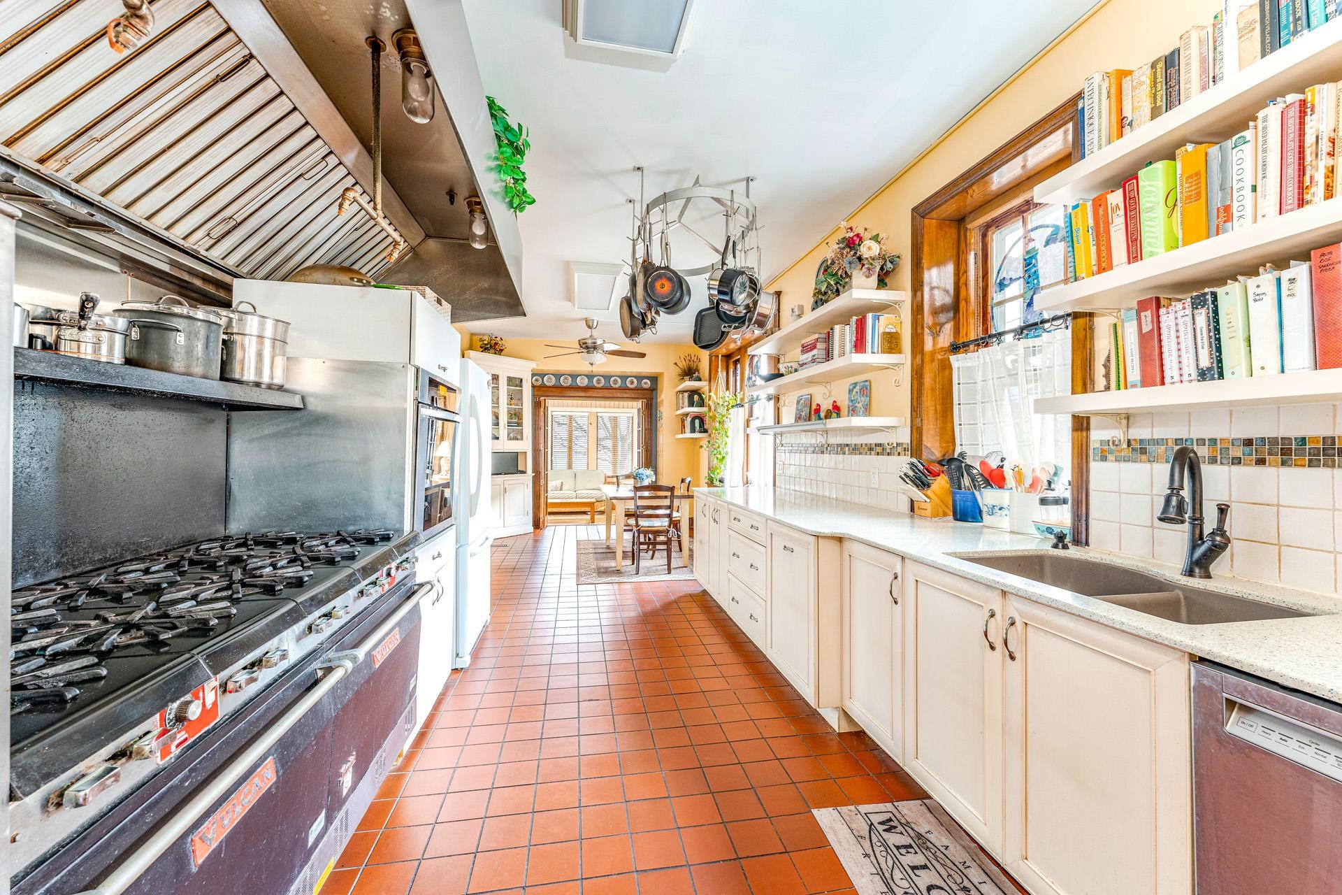 825 Bay Somers Point, NJ 08244 - Photo 6 of 41 a kitchen with stainless steel appliances granite countertop a stove and cabinets