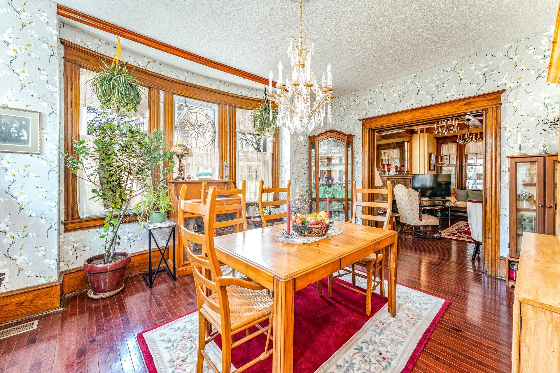 825 Bay Somers Point, NJ 08244 - Photo 10 of 41 a view of a dining room with furniture wooden floor and chandelier