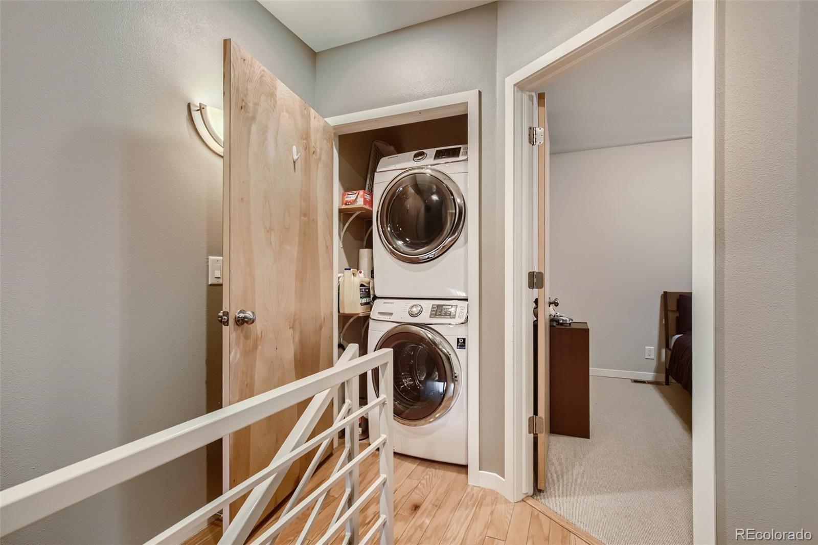 826 25th Street Denver, CO 80205 - Photo 19 of 23 a view of a hallway with washer and dryer