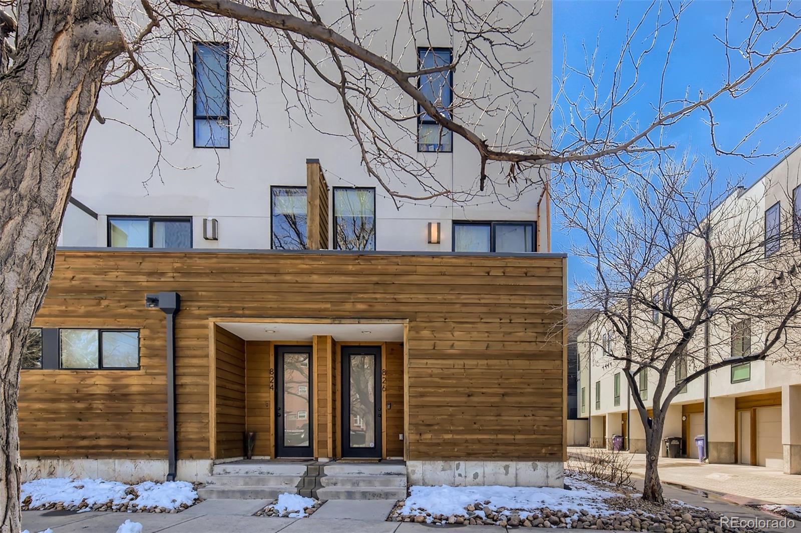 826 25th Street Denver, CO 80205 - Photo 2 of 23 front view of a house with a street