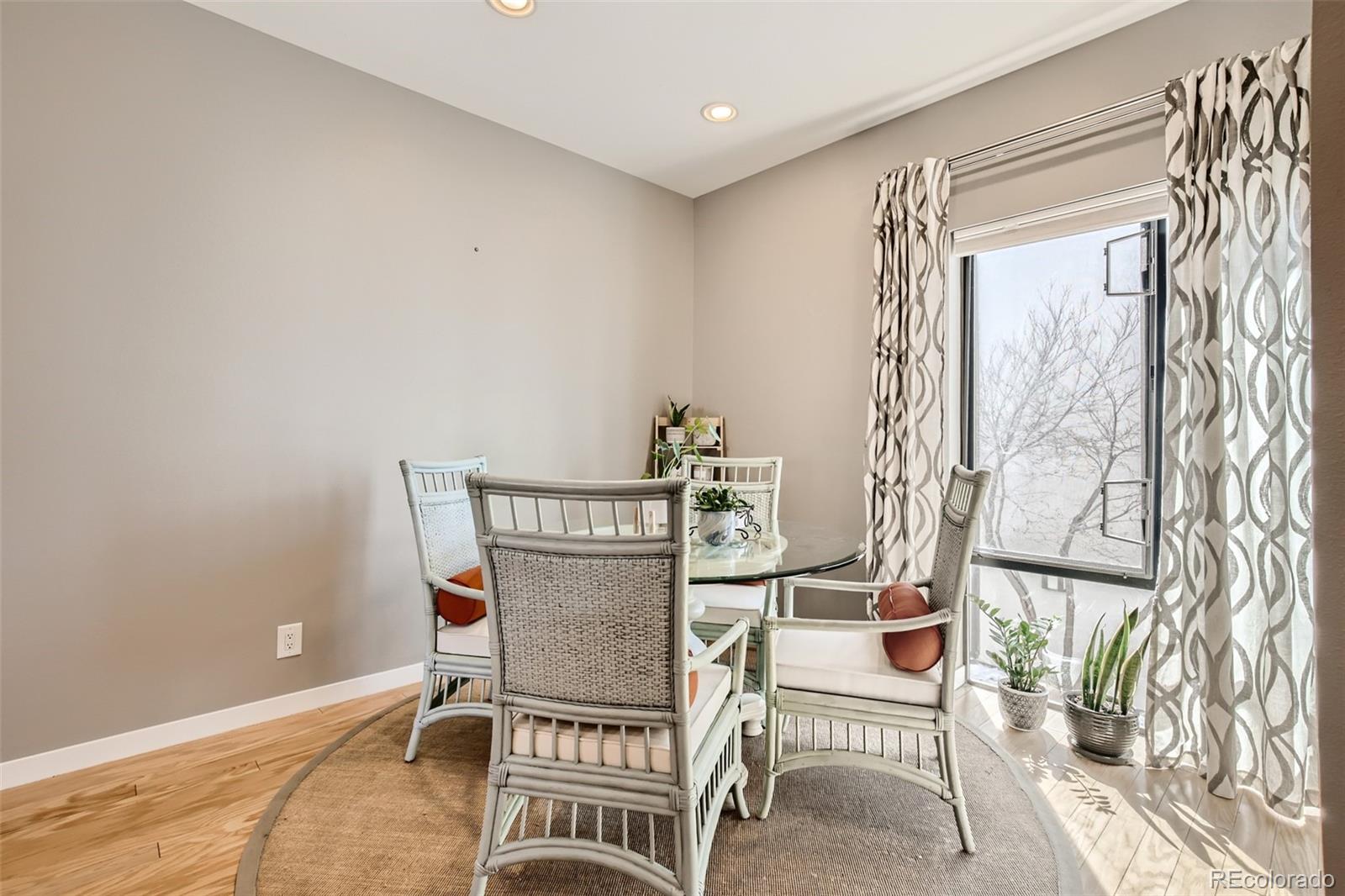 826 25th Street Denver, CO 80205 - Photo 10 of 23 a view of a room with a table and chairs