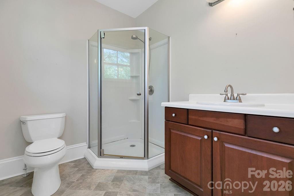 208 West Probart Street Brevard, NC 28712 - Photo 37 of 48 a bathroom with a sink and a toilet