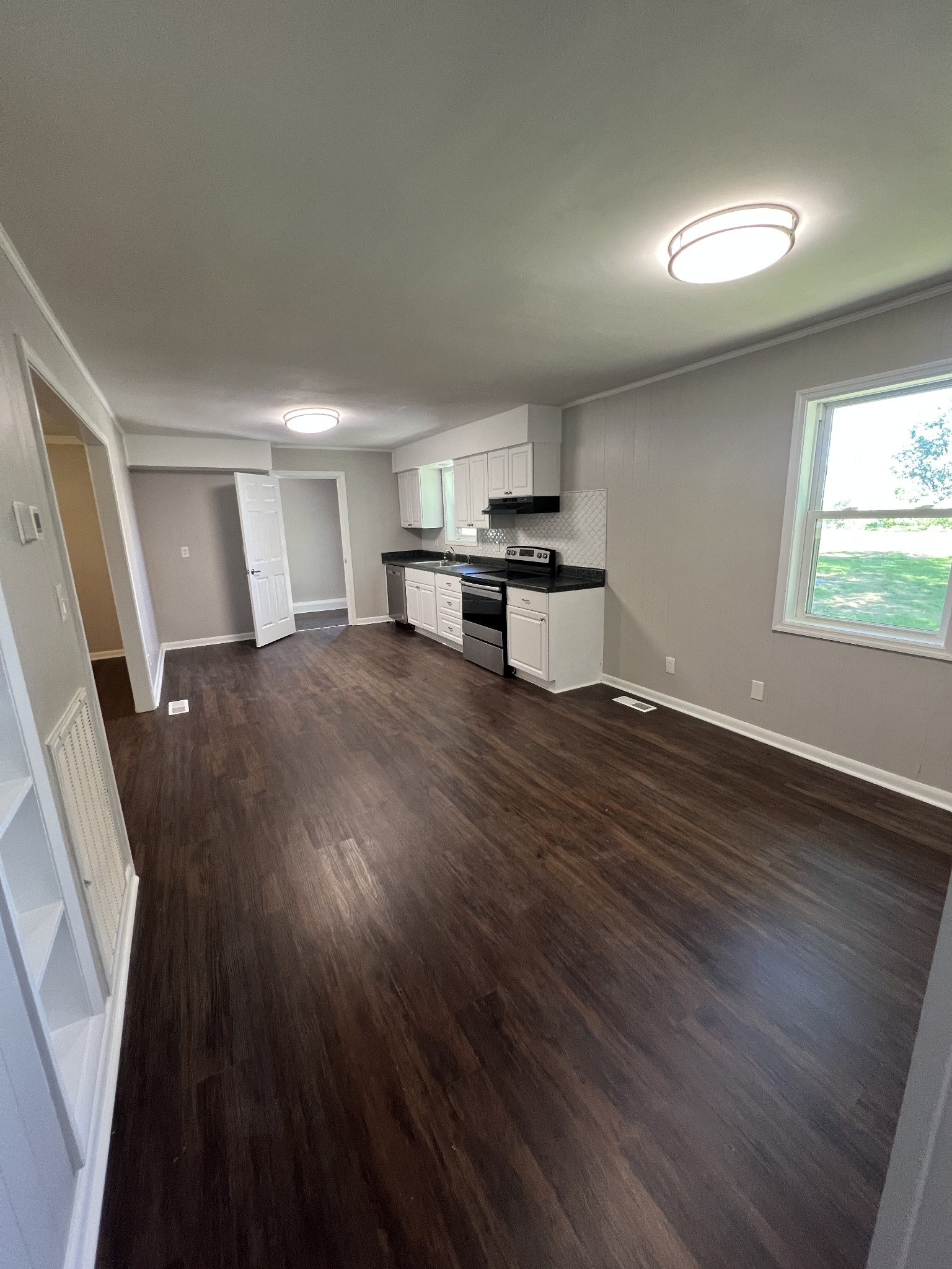 1846 Patrick Road Pulaski, TN 38478 - Photo 11 of 26 a view of kitchen and sink with wooden floor