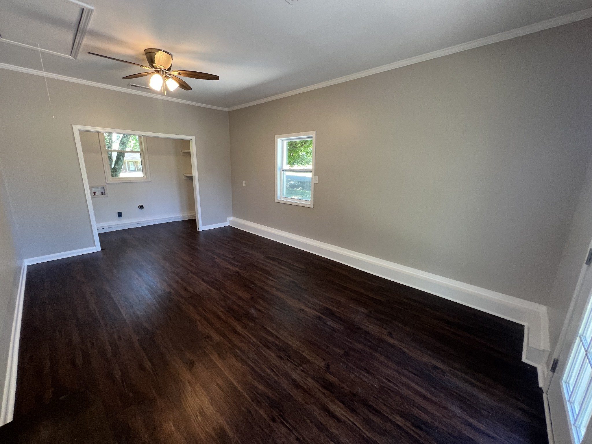 1846 Patrick Road Pulaski, TN 38478 - Photo 12 of 26 wooden floor in an empty room with a window