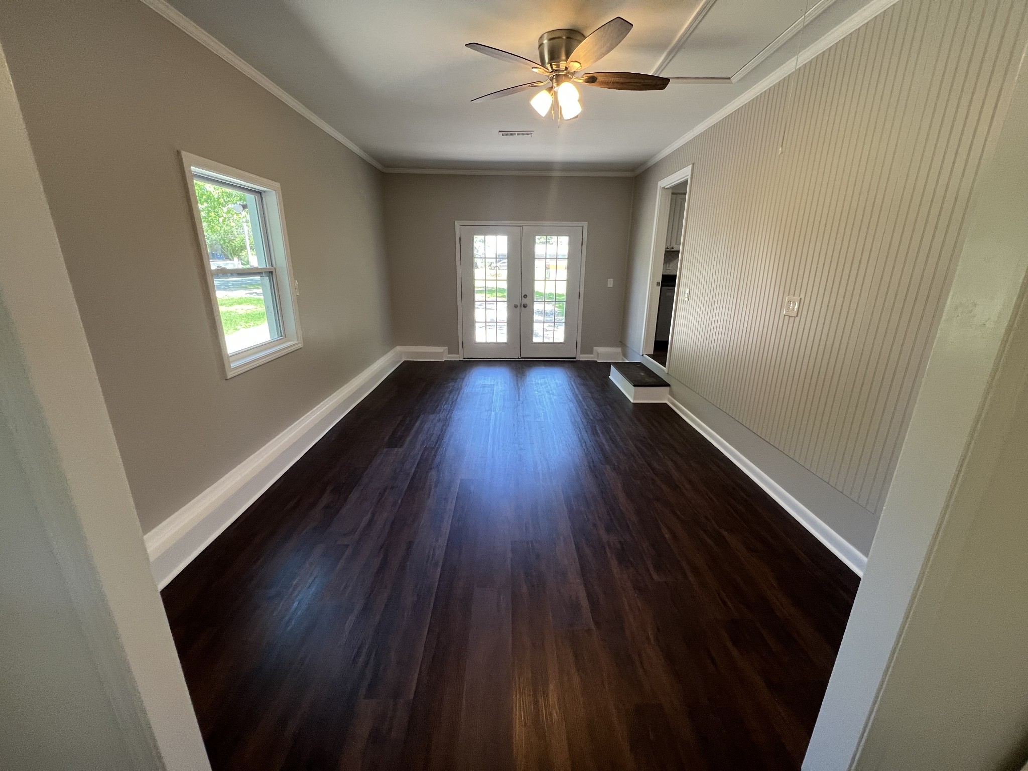 1846 Patrick Road Pulaski, TN 38478 - Photo 13 of 26 wooden floor in an empty room with a window