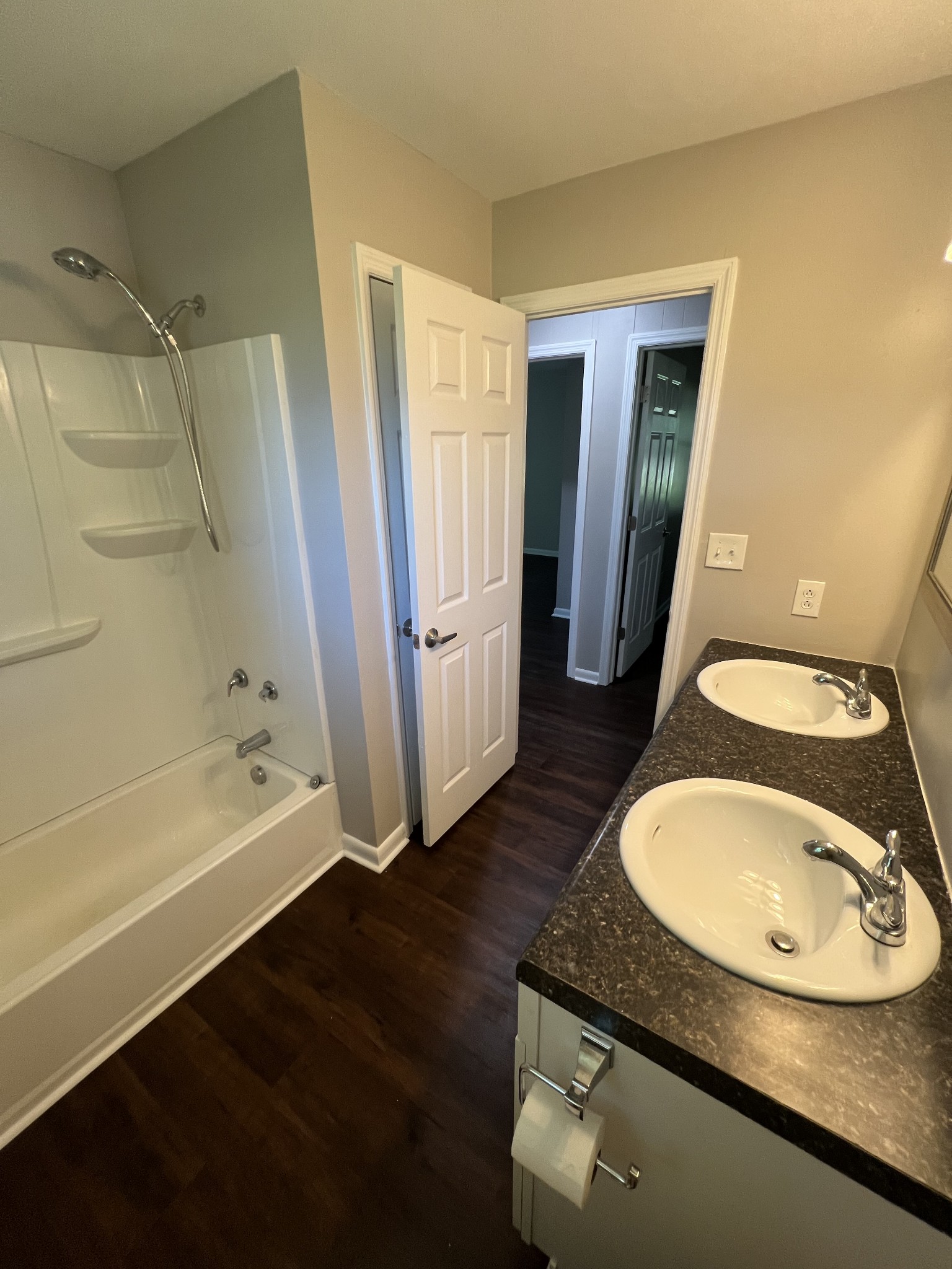 1846 Patrick Road Pulaski, TN 38478 - Photo 24 of 26 a bathroom with a sink a bathtub and a mirror