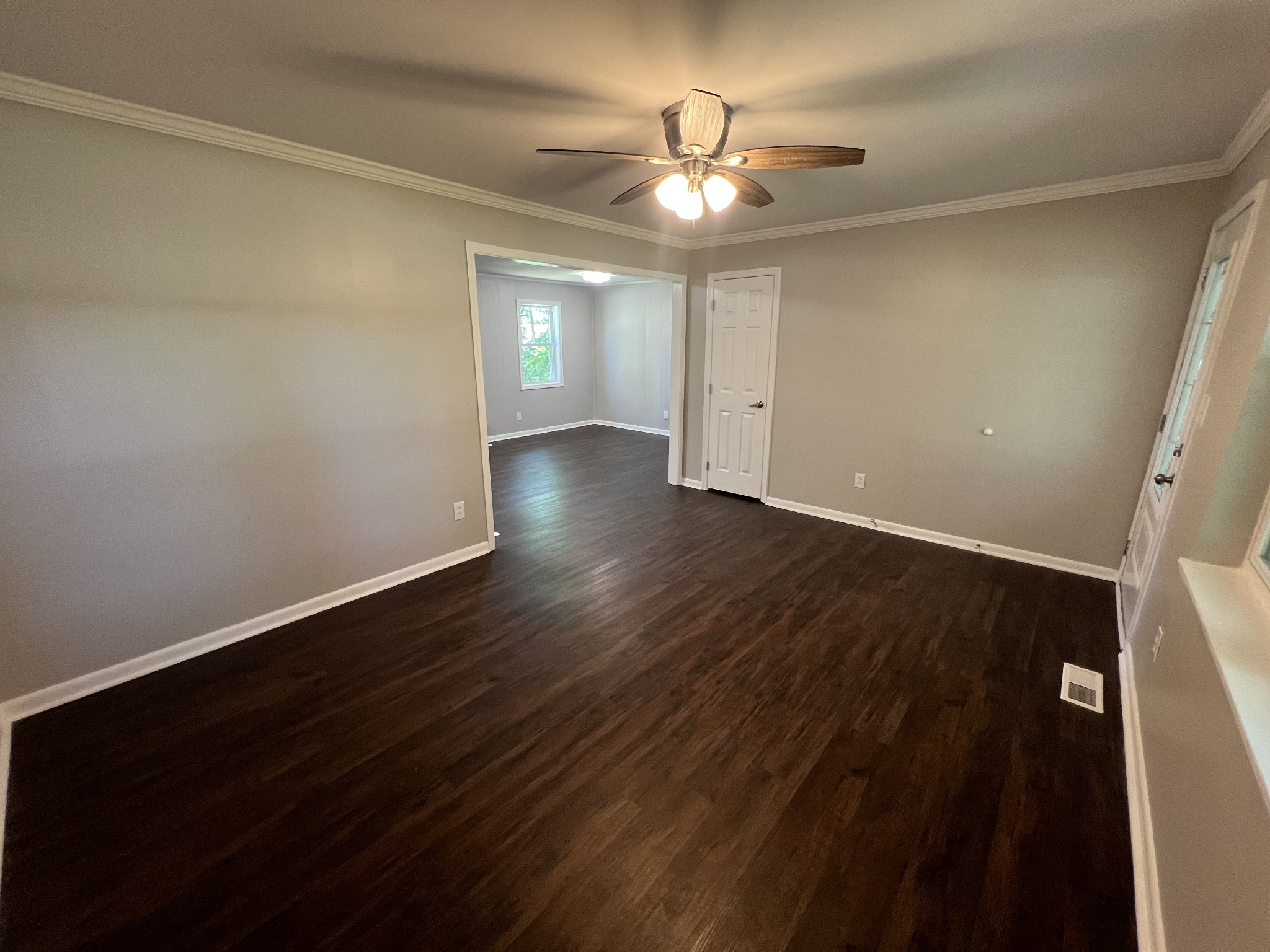 1846 Patrick Road Pulaski, TN 38478 - Photo 5 of 26 wooden floor in an empty room with a window