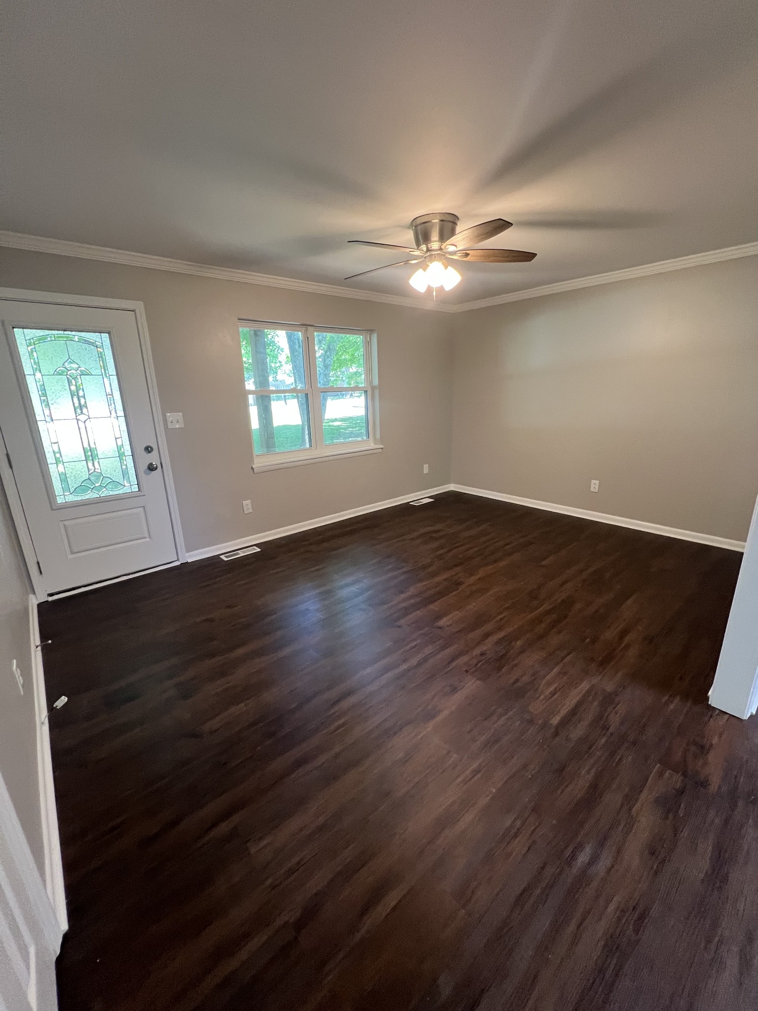 1846 Patrick Road Pulaski, TN 38478 - Photo 6 of 26 a view of empty room with wooden floor and fan