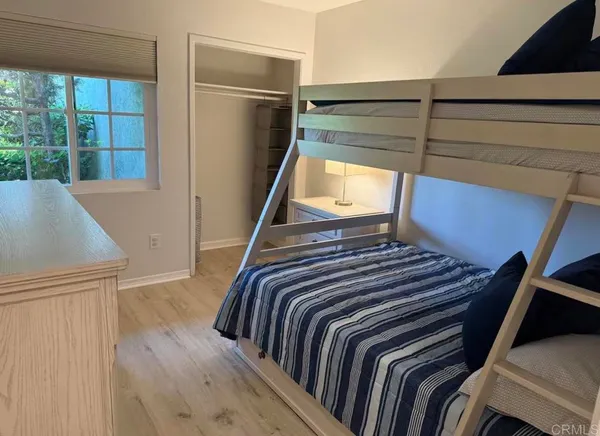 a view of balcony and wooden floor