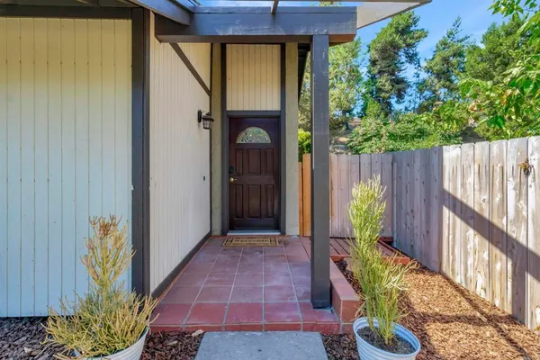 a front view of a house with a porch