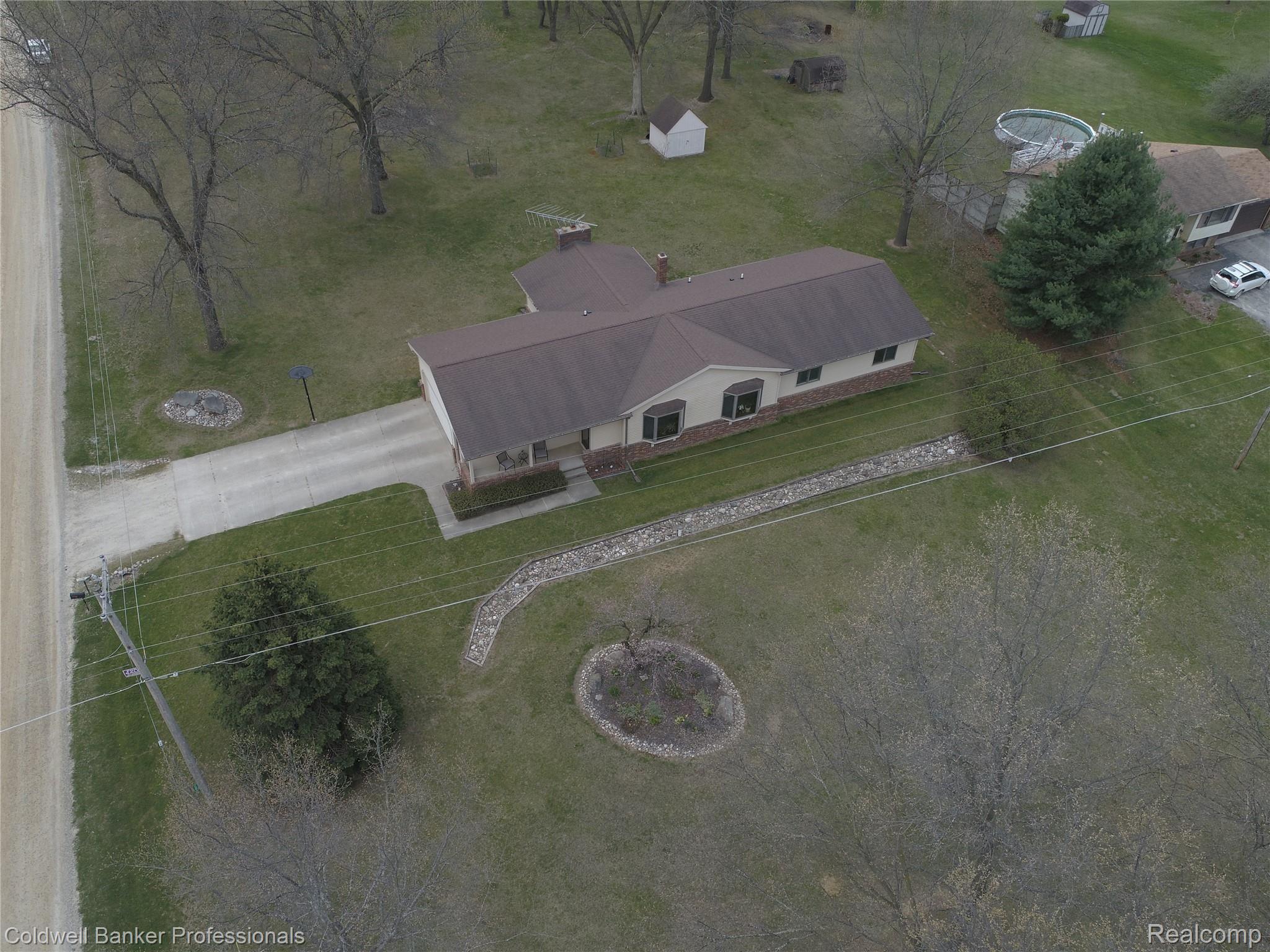 1191 West Sutton Road Metamora, MI 48455 - Photo 9 of 63 front corner high.JPG