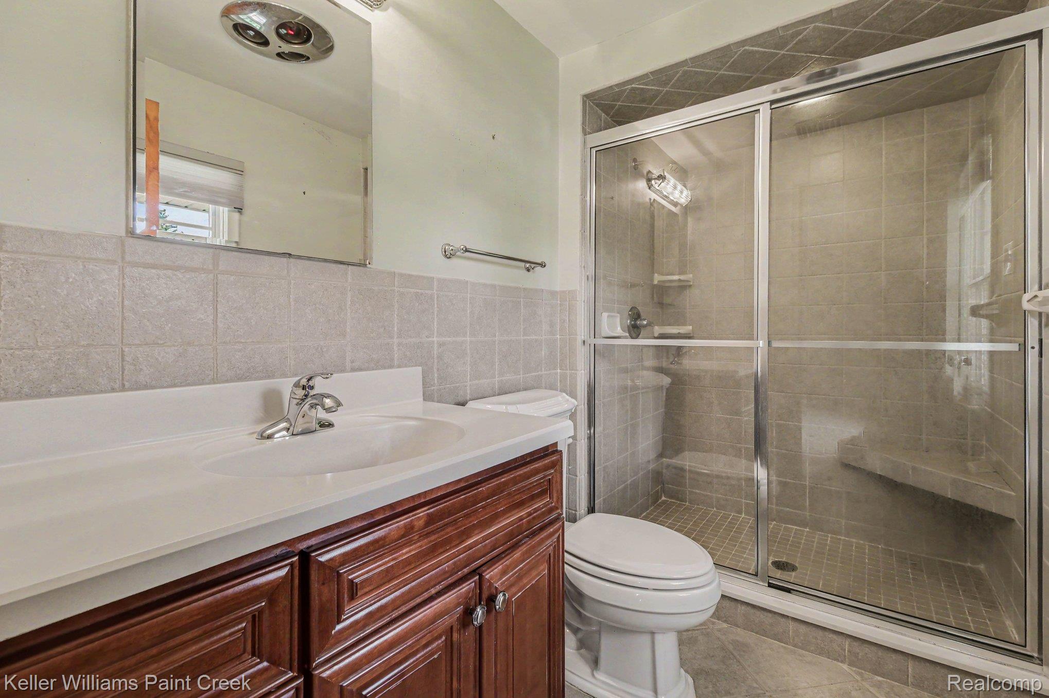914 Croydon Road Rochester, MI 48309 - Photo 12 of 24 The primary bath is private with a large ceramic shower.