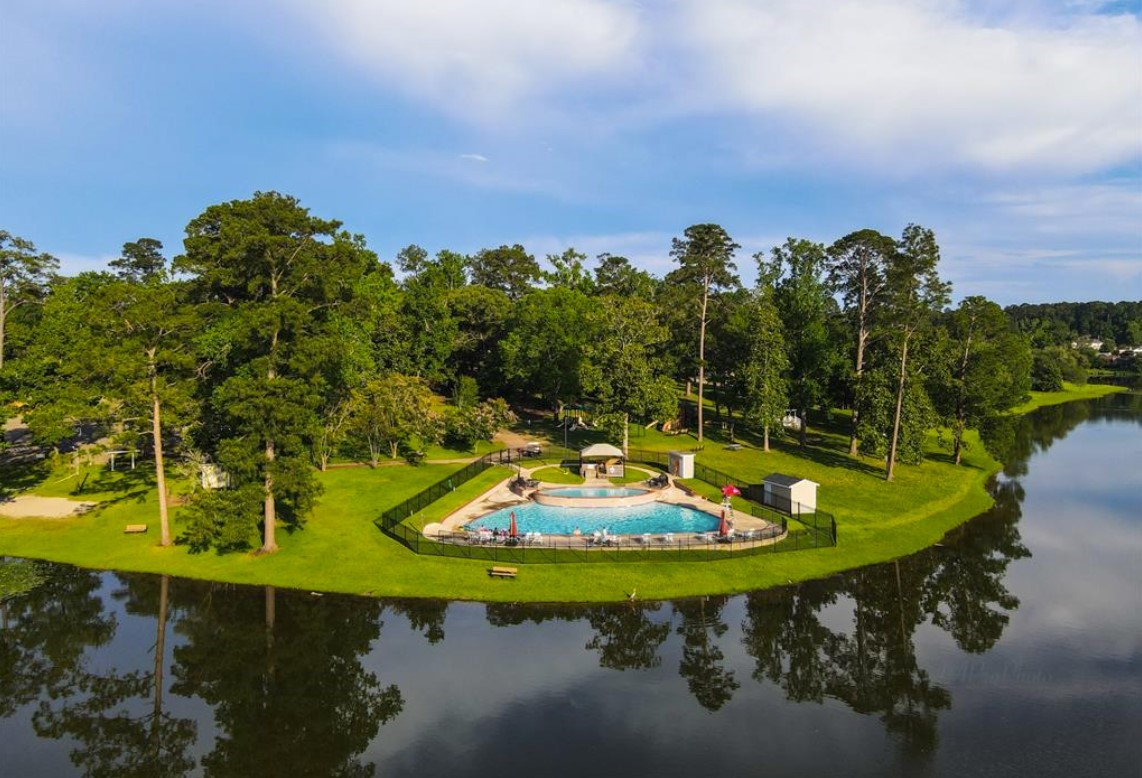 7 Hogan Lane Huntsville, TX 77340 - Photo 12 of 21 a view of a swimming pool with a yard and mountain view