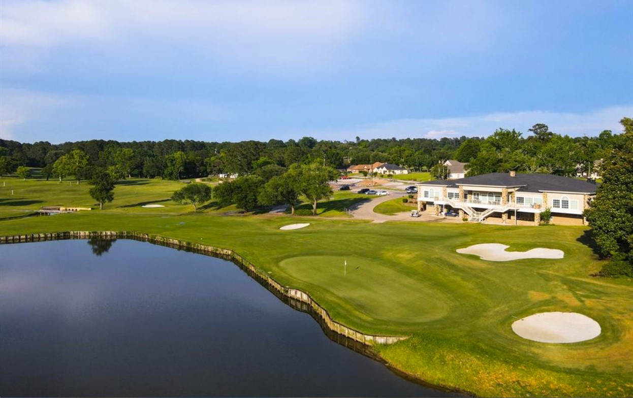 7 Hogan Lane Huntsville, TX 77340 - Photo 16 of 21 a view of a swimming pool with a yard and a mountain view