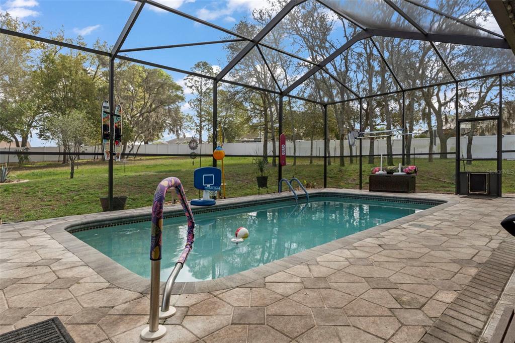 1378 Matthew Avenue Spring Hill, FL 34609 - Photo 30 of 56 a swimming pool with a yard